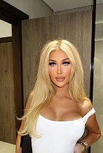 Ukrainian mail order bride Emilie from Copenhagen with blonde hair and blue eye color - image 11