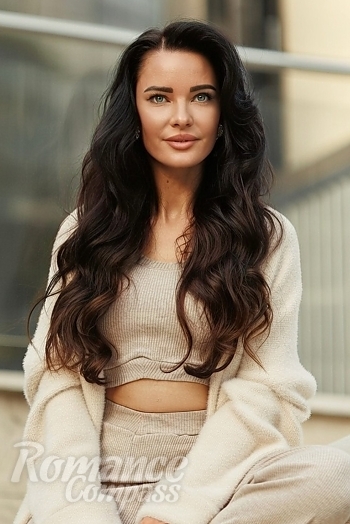 Ukrainian mail order bride Yana from Kyiv with brunette hair and blue eye color - image 1