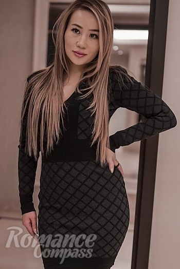 Ukrainian mail order bride Indira from Astana with blonde hair and brown eye color - image 1