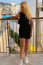 Ukrainian mail order bride Liudmyla from Kyiv with blonde hair and green eye color - image 16