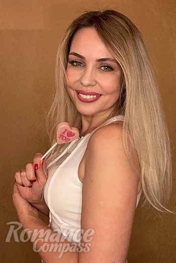 Ukrainian mail order bride Liudmyla from Kyiv with blonde hair and green eye color - image 1