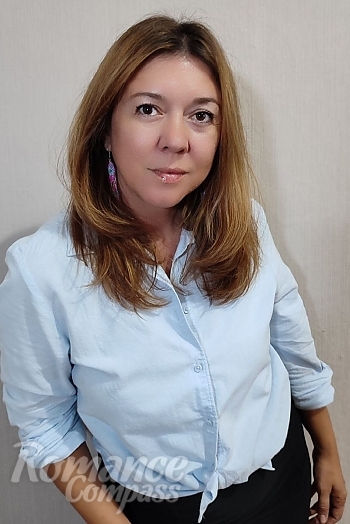 Ukrainian mail order bride Larisa from Kamianets-Podilskyi with light brown hair and brown eye color - image 1