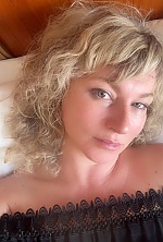 Ukrainian mail order bride Elena from Botoșani with light brown hair and green eye color - image 12