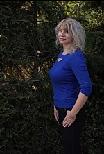 Ukrainian mail order bride Elena from Botoșani with light brown hair and green eye color - image 2