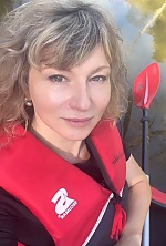 Ukrainian mail order bride Elena from Botoșani with light brown hair and green eye color - image 8