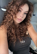 Ukrainian mail order bride Anastasia from Kyiv with black hair and brown eye color - image 14