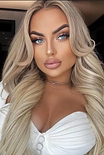 Ukrainian mail order bride Ivanna from Kyiv with blonde hair and blue eye color - image 12