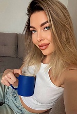 Ukrainian mail order bride Olena from Limassol with light brown hair and blue eye color - image 3