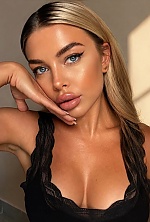 Ukrainian mail order bride Olena from Limassol with light brown hair and blue eye color - image 12