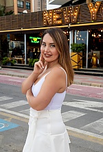 Ukrainian mail order bride Aziza from Alicante with light brown hair and green eye color - image 11
