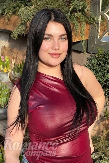 Ukrainian mail order bride Ivanna from Ivano-Frankivsk with black hair and green eye color - image 1