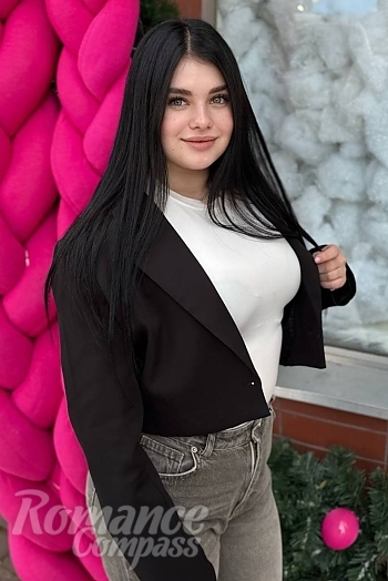 Ukrainian mail order bride Ivanna from Ivano-Frankivsk with black hair and green eye color - image 1