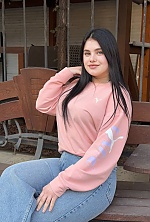 Ukrainian mail order bride Ivanna from Ivano-Frankivsk with black hair and green eye color - image 14