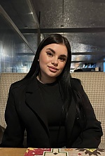 Ukrainian mail order bride Ivanna from Ivano-Frankivsk with black hair and green eye color - image 6