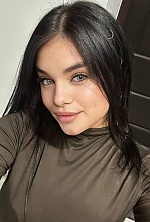 Ukrainian mail order bride Ivanna from Ivano-Frankivsk with black hair and green eye color - image 10