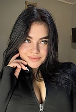 Ukrainian mail order bride Ivanna from Ivano-Frankivsk with black hair and green eye color - image 7