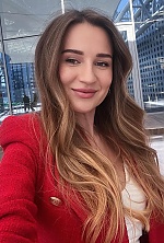 Ukrainian mail order bride Anastasia from Odesa with light brown hair and green eye color - image 10