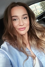 Ukrainian mail order bride Anastasia from Odesa with light brown hair and green eye color - image 11