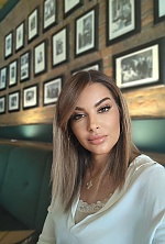 Ukrainian mail order bride Ivana from Belgrade with light brown hair and green eye color - image 32