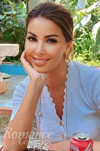 Ukrainian mail order bride Ivana from Belgrade with light brown hair and green eye color - image 1