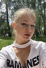 Ukrainian mail order bride Sofiia from Kyiv with blonde hair and blue eye color - image 7