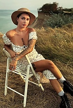 Ukrainian mail order bride Olha from Odesa with brunette hair and brown eye color - image 4