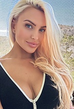 Ukrainian mail order bride Lilly from London with blonde hair and blue eye color - image 4