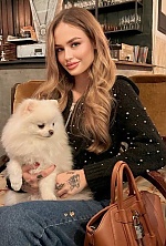 Ukrainian mail order bride Dariia from Madrid with light brown hair and green eye color - image 7