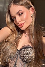 Ukrainian mail order bride Dariia from Madrid with light brown hair and green eye color - image 2