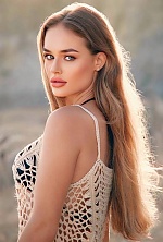 Ukrainian mail order bride Dariia from Madrid with light brown hair and green eye color - image 9
