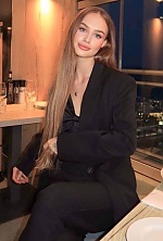 Ukrainian mail order bride Dariia from Madrid with light brown hair and green eye color - image 10