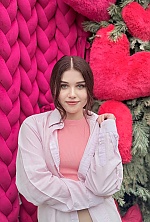 Ukrainian mail order bride Anastasiia from Ivano-Frankivsk with light brown hair and green eye color - image 7