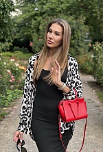 Ukrainian mail order bride Olivia from Montreal with light brown hair and blue eye color - image 2