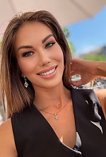 Ukrainian mail order bride Olivia from Montreal with light brown hair and blue eye color - image 8