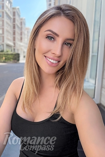 Ukrainian mail order bride Anastasia from Kyiv with blonde hair and green eye color - image 1