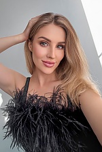 Ukrainian mail order bride Anastasia from Kyiv with blonde hair and green eye color - image 7