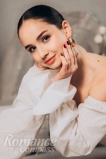 Ukrainian mail order bride Olena from Odesa with brunette hair and blue eye color - image 1