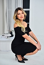 Ukrainian mail order bride Hanna from Kyiv with blonde hair and hazel eye color - image 7