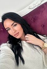 Ukrainian mail order bride Svitlana from Verona with black hair and green eye color - image 2