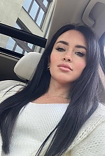 Ukrainian mail order bride Svitlana from Verona with black hair and green eye color - image 9
