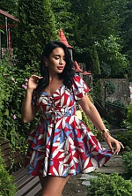 Ukrainian mail order bride Svitlana from Verona with black hair and green eye color - image 22