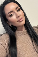Ukrainian mail order bride Svitlana from Verona with black hair and green eye color - image 17