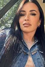 Ukrainian mail order bride Svitlana from Verona with black hair and green eye color - image 14