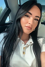 Ukrainian mail order bride Svitlana from Verona with black hair and green eye color - image 31