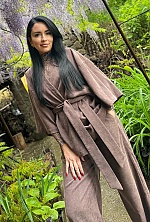 Ukrainian mail order bride Svitlana from Verona with black hair and green eye color - image 11