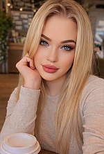 Ukrainian mail order bride Angelina from Kyiv with blonde hair and blue eye color - image 4