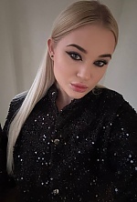 Ukrainian mail order bride Angelina from Kyiv with blonde hair and blue eye color - image 6