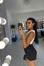 Ukrainian mail order bride Yuliia from Kyiv with black hair and brown eye color - image 6