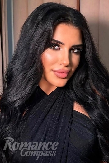 Ukrainian mail order bride Yuliia from Kyiv with black hair and brown eye color - image 1