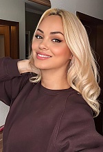 Ukrainian mail order bride Nadiia from Munich with blonde hair and green eye color - image 4
